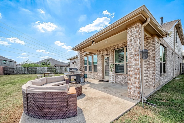 2226 Blakely Grove Ln, Richmond, TX 77469 - fenced backyard featuring a patio area, outdoor lounge area, and grilling area