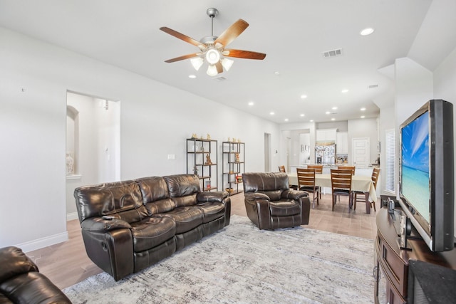 19822 Blue Roan Dr, Tomball, TX 77377 - living room with ceiling fan, light wood-type flooring, and recessed lighting