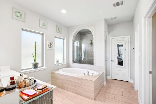 19822 Blue Roan Dr, Tomball, TX 77377 - bathroom with a bath and recessed lighting