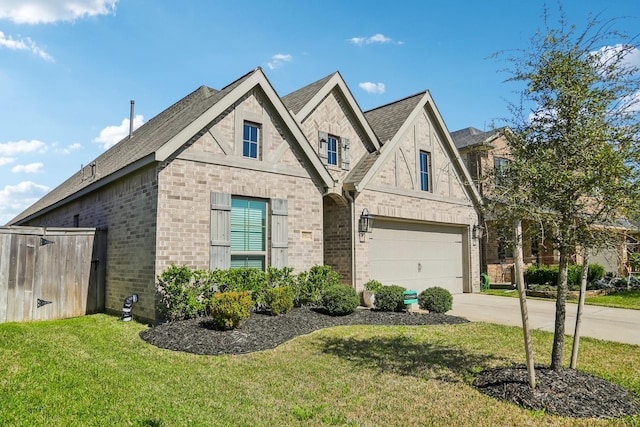 19822 Blue Roan Dr, Tomball, TX 77377 - french country inspired facade featuring concrete driveway, brick siding, a garage, and roof with shingles