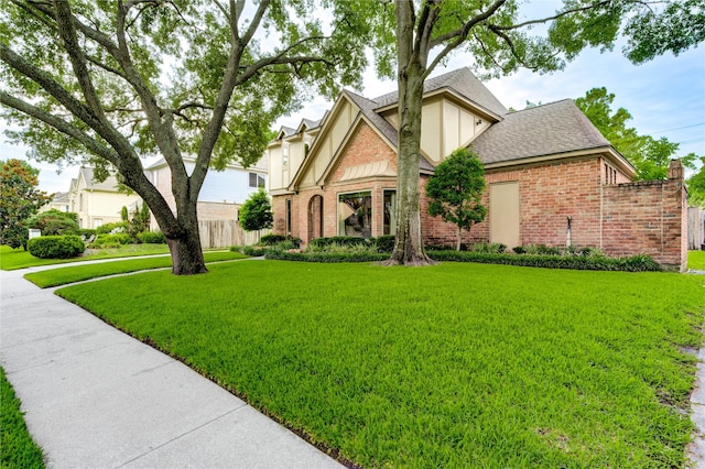 11410 Del Monte Dr, Houston, TX 77077 - view of front of house featuring brick siding, roof with shingles, and stucco siding