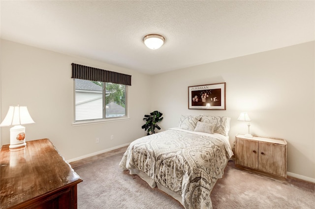 11410 Del Monte Dr, Houston, TX 77077 - bedroom featuring light colored carpet and baseboards