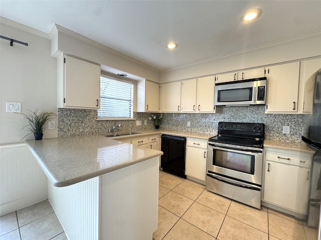 1083 Country Place Dr Unit 28, Houston, TX 77079 - kitchen featuring black appliances, crown molding, a peninsula, light tile patterned floors, and light countertops