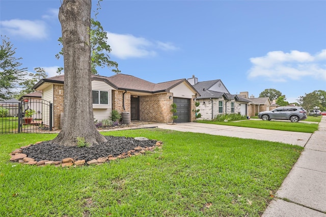 2806 Spring Dusk Ln, Spring, TX 77373 - view of front of home with concrete driveway, brick siding, an attached garage, and a gate