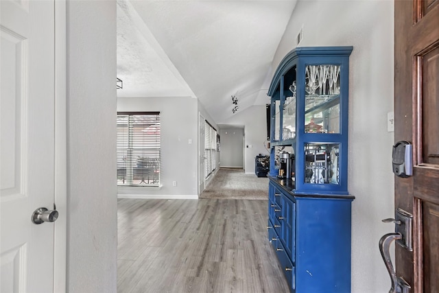 2806 Spring Dusk Ln, Spring, TX 77373 - foyer with lofted ceiling and light wood-type flooring