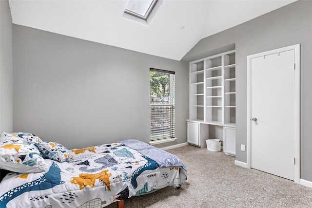 2806 Spring Dusk Ln, Spring, TX 77373 - bedroom with a skylight, lofted ceiling, and carpet floors