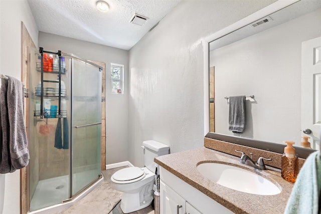 2806 Spring Dusk Ln, Spring, TX 77373 - bathroom featuring vanity, a shower stall, and a textured ceiling