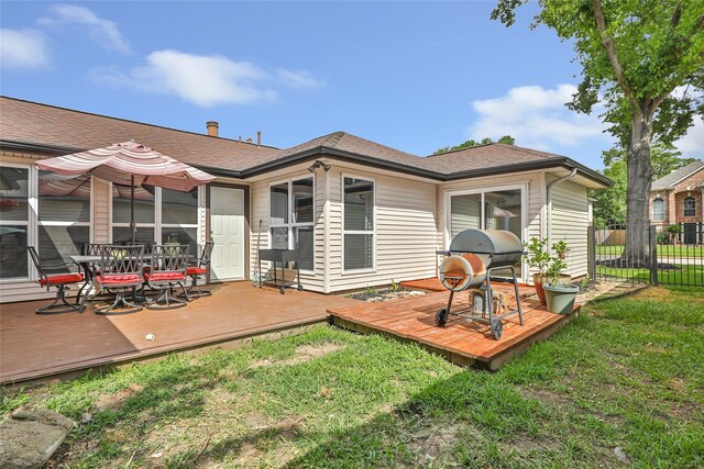 2806 Spring Dusk Ln, Spring, TX 77373 - back of house with outdoor dining space, a wooden deck, and roof with shingles