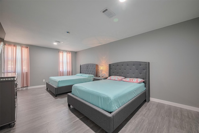 12206 Green Glade Dr, Houston, TX 77099 - bedroom with light wood finished floors
