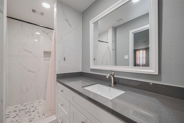 12206 Green Glade Dr, Houston, TX 77099 - full bathroom with vanity and a marble finish shower