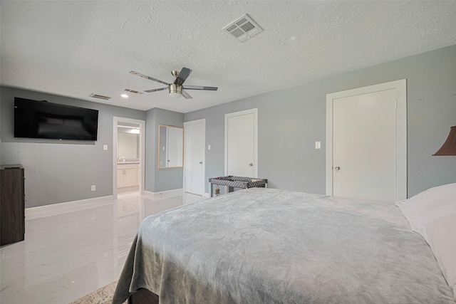 12206 Green Glade Dr, Houston, TX 77099 - bedroom featuring a textured ceiling, marble look tiles, a ceiling fan, and ensuite bath