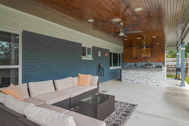 12206 Green Glade Dr, Houston, TX 77099 - view of patio / terrace with exterior kitchen, outdoor lounge area, and ceiling fan