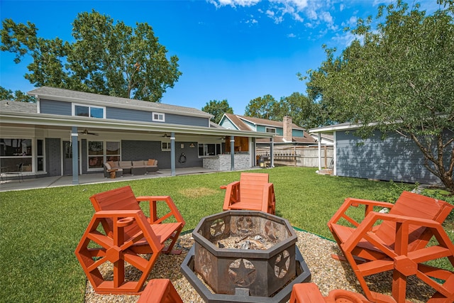 12206 Green Glade Dr, Houston, TX 77099 - view of yard with a ceiling fan, a patio, and an outdoor living space with a fire pit