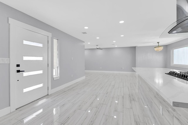 4927 Kelso St, Houston, TX 77021 - foyer with recessed lighting and light wood-style flooring