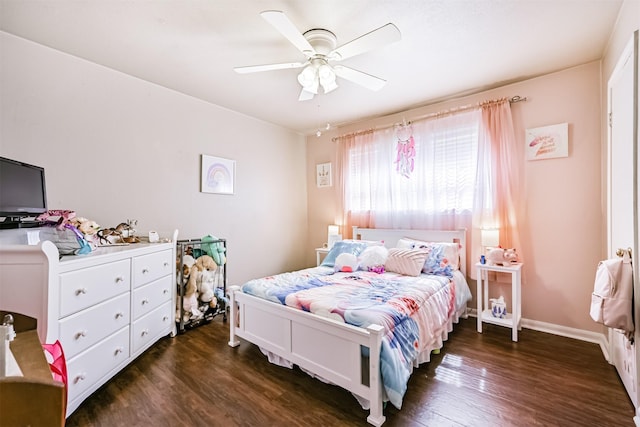 114 Wyndwood Dr, Seabrook, TX 77586 - bedroom with dark wood-style floors and ceiling fan