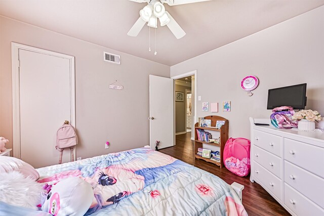 114 Wyndwood Dr, Seabrook, TX 77586 - bedroom featuring dark wood-style flooring and ceiling fan