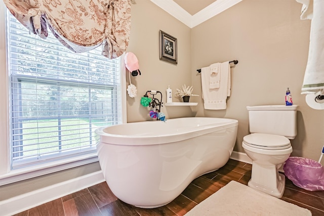 114 Wyndwood Dr, Seabrook, TX 77586 - bathroom featuring a freestanding bath, wood finished floors, and ornamental molding