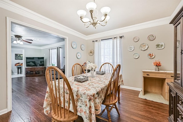 114 Wyndwood Dr, Seabrook, TX 77586 - dining room featuring a chandelier, healthy amount of natural light, dark wood-style floors, crown molding, and a ceiling fan