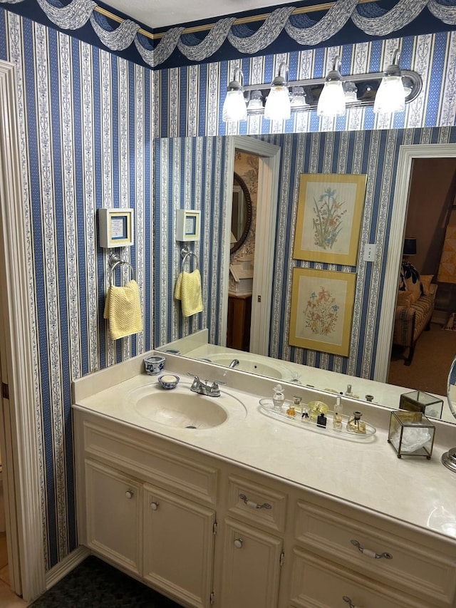 1110 Ivy Ave, Deer Park, TX 77536 - bathroom with wallpapered walls and vanity
