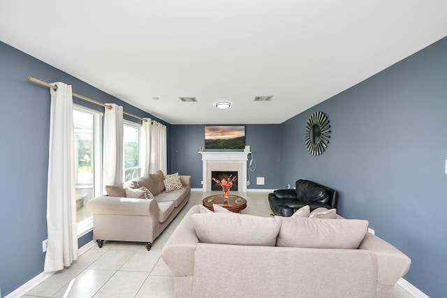 14907 Leila Oaks Cir, Houston, TX 77082 - living area featuring a fireplace and light tile patterned flooring