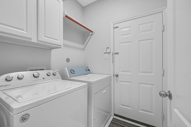 706 Overdell Dr, Sugar Land, TX 77479 - laundry area with cabinet space and separate washer and dryer