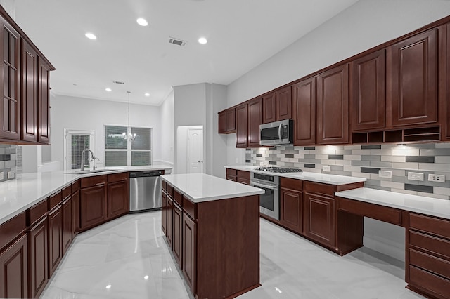 706 Overdell Dr, Sugar Land, TX 77479 - kitchen featuring stainless steel appliances, decorative backsplash, light marble finish floors, a chandelier, and light countertops