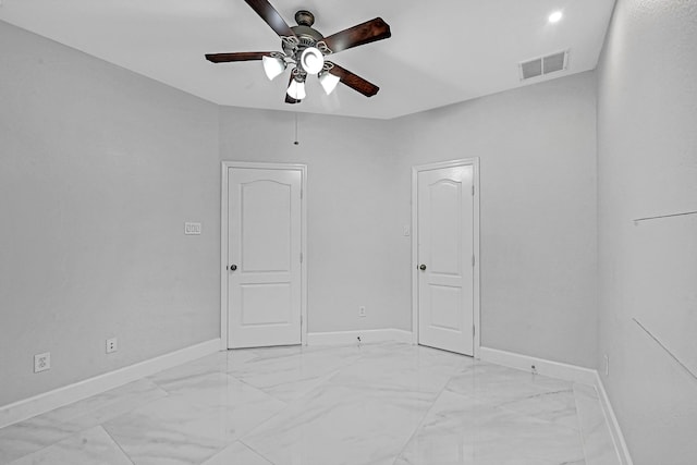 706 Overdell Dr, Sugar Land, TX 77479 - unfurnished room with light marble finish floors and ceiling fan