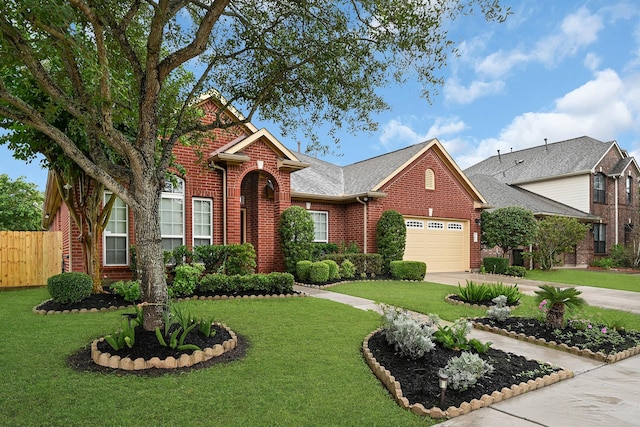 706 Overdell Dr, Sugar Land, TX 77479 - traditional-style house featuring brick siding, driveway, and a garage
