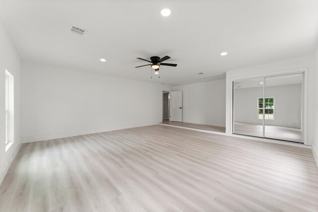 519 Tallow Dr, Conroe, TX 77385 - empty room with light wood-type flooring, recessed lighting, and a ceiling fan