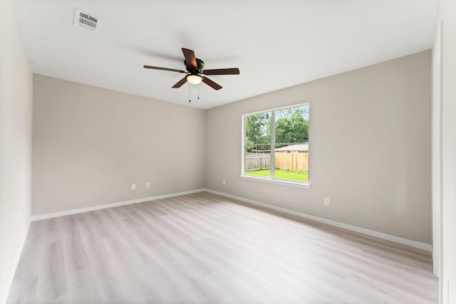 519 Tallow Dr, Conroe, TX 77385 - spare room with light wood-style flooring and ceiling fan