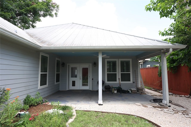 212 Greenwood St, Houston, TX 77011 - rear view of house with french doors, a patio area, a metal roof, and ceiling fan