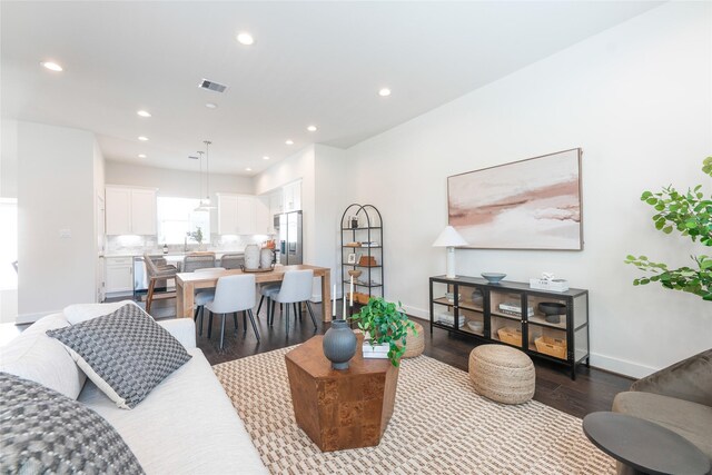5502E Wheatley St, Houston, TX 77091 - living area with dark wood-type flooring and recessed lighting