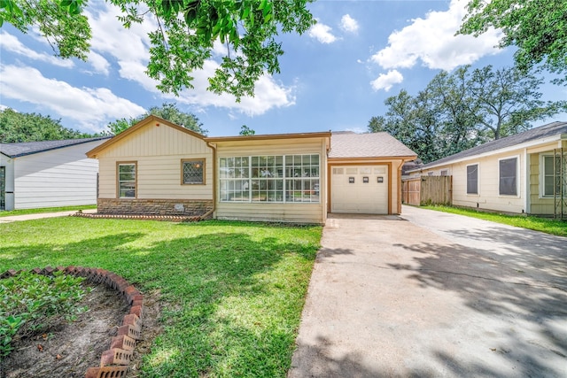 1309 Jefferson St, Baytown, TX 77520 - single story home with an attached garage and driveway