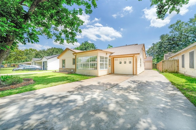 1309 Jefferson St, Baytown, TX 77520 - ranch-style home featuring driveway and a garage