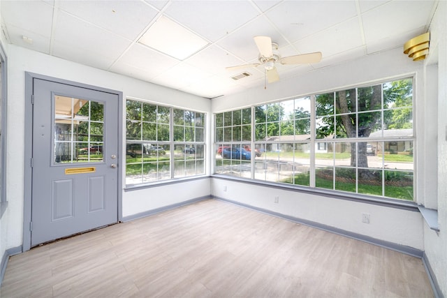 1309 Jefferson St, Baytown, TX 77520 - unfurnished sunroom featuring ceiling fan and plenty of natural light