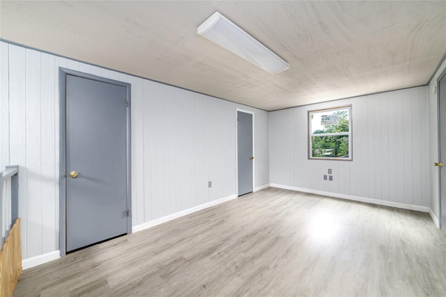1309 Jefferson St, Baytown, TX 77520 - unfurnished bedroom featuring wood finished floors and baseboards