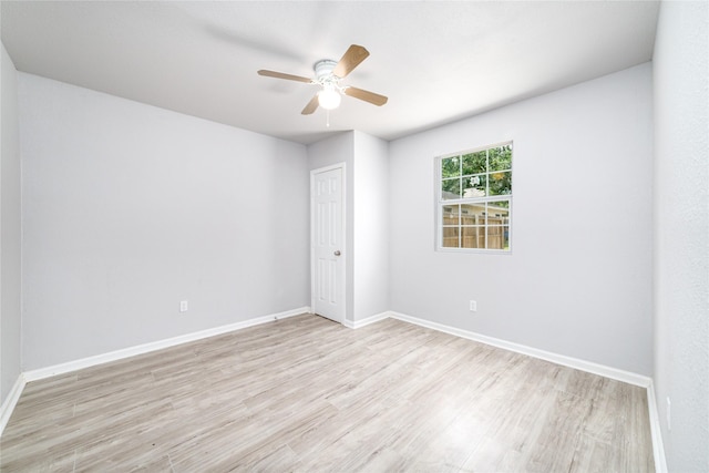 1309 Jefferson St, Baytown, TX 77520 - spare room featuring light wood finished floors and a ceiling fan