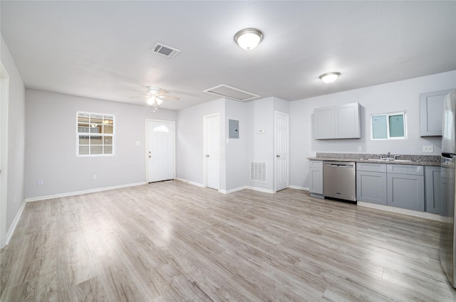 1309 Jefferson St, Baytown, TX 77520 - kitchen featuring dishwasher, gray cabinetry, ceiling fan, and light wood-style flooring