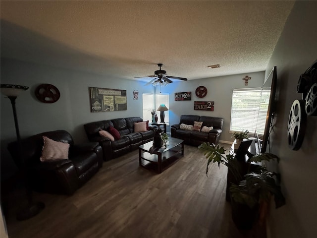 128 Hidden Lake Dr, League City, TX 77573 - living room with wood finished floors, a ceiling fan, and a textured ceiling