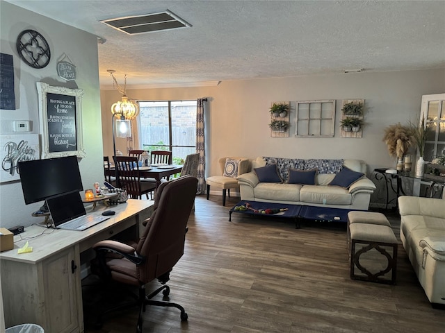 128 Hidden Lake Dr, League City, TX 77573 - office area with a textured ceiling, wood finished floors, and a chandelier
