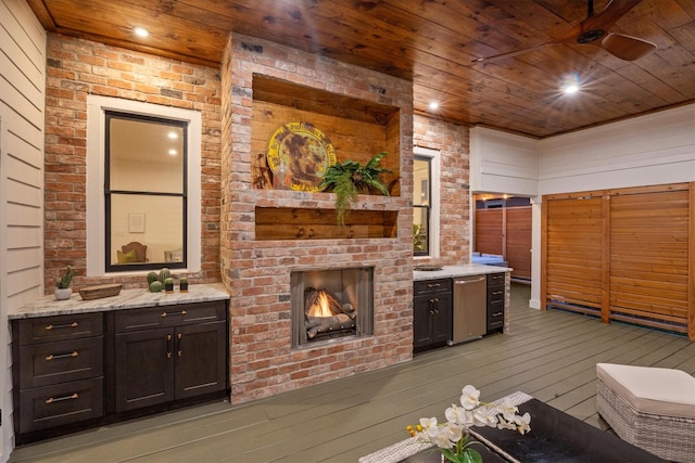 1543 Columbia St, Houston, TX 77008 - wooden terrace with an outdoor brick fireplace