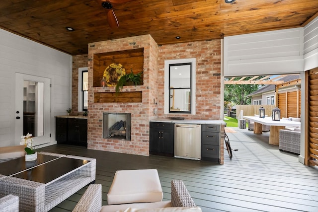 1543 Columbia St, Houston, TX 77008 - wooden terrace with an outdoor brick fireplace and outdoor dining space