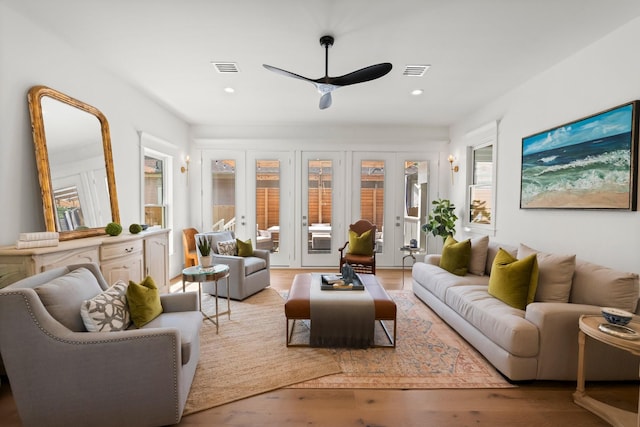 1543 Columbia St, Houston, TX 77008 - living area with wood finished floors, ceiling fan, and recessed lighting