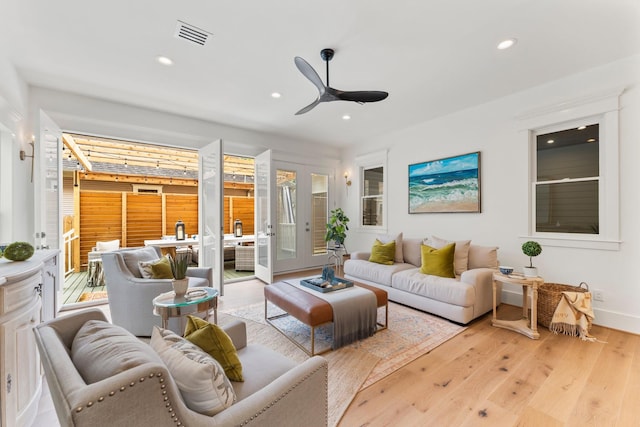 1543 Columbia St, Houston, TX 77008 - living room featuring ceiling fan, recessed lighting, and light wood-style floors