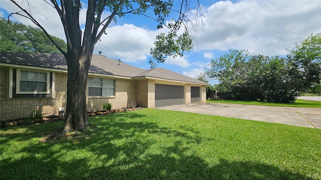 2402 Heather St, Highlands, TX 77562 - single story home with brick siding, a garage, a front lawn, and driveway