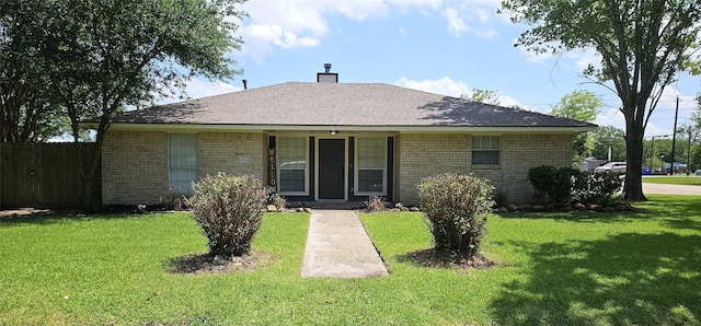 2402 Heather St, Highlands, TX 77562 - view of front of property with brick siding and a chimney