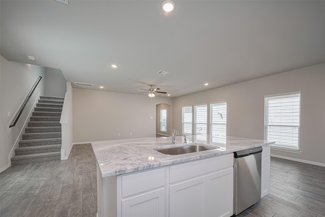 24711 Sonora Crescent Cir, Huffman, TX 77336 - kitchen featuring dishwasher, light wood-style flooring, ceiling fan, an island with sink, and recessed lighting