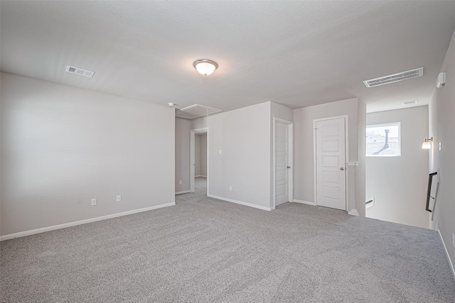 24711 Sonora Crescent Cir, Huffman, TX 77336 - carpeted spare room with attic access and baseboards