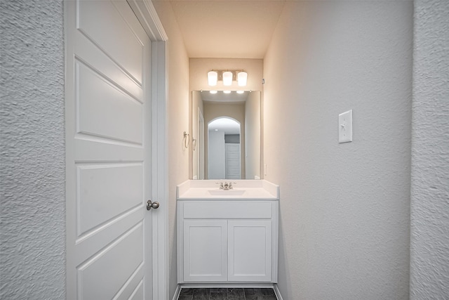 24711 Sonora Crescent Cir, Huffman, TX 77336 - bathroom with vanity and a textured wall
