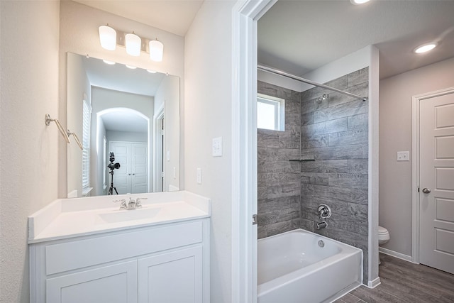 24711 Sonora Crescent Cir, Huffman, TX 77336 - bathroom featuring vanity, shower / bathtub combination, and wood finished floors